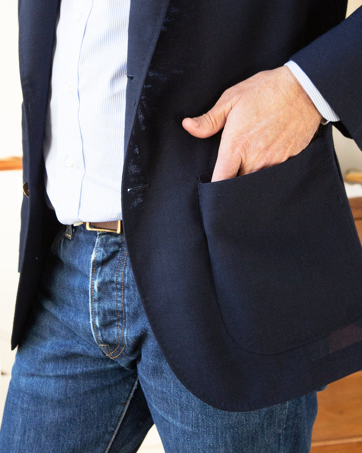 Lower patch pocket details of the Sid Mashburn Navy High Twist Ghost Blazer