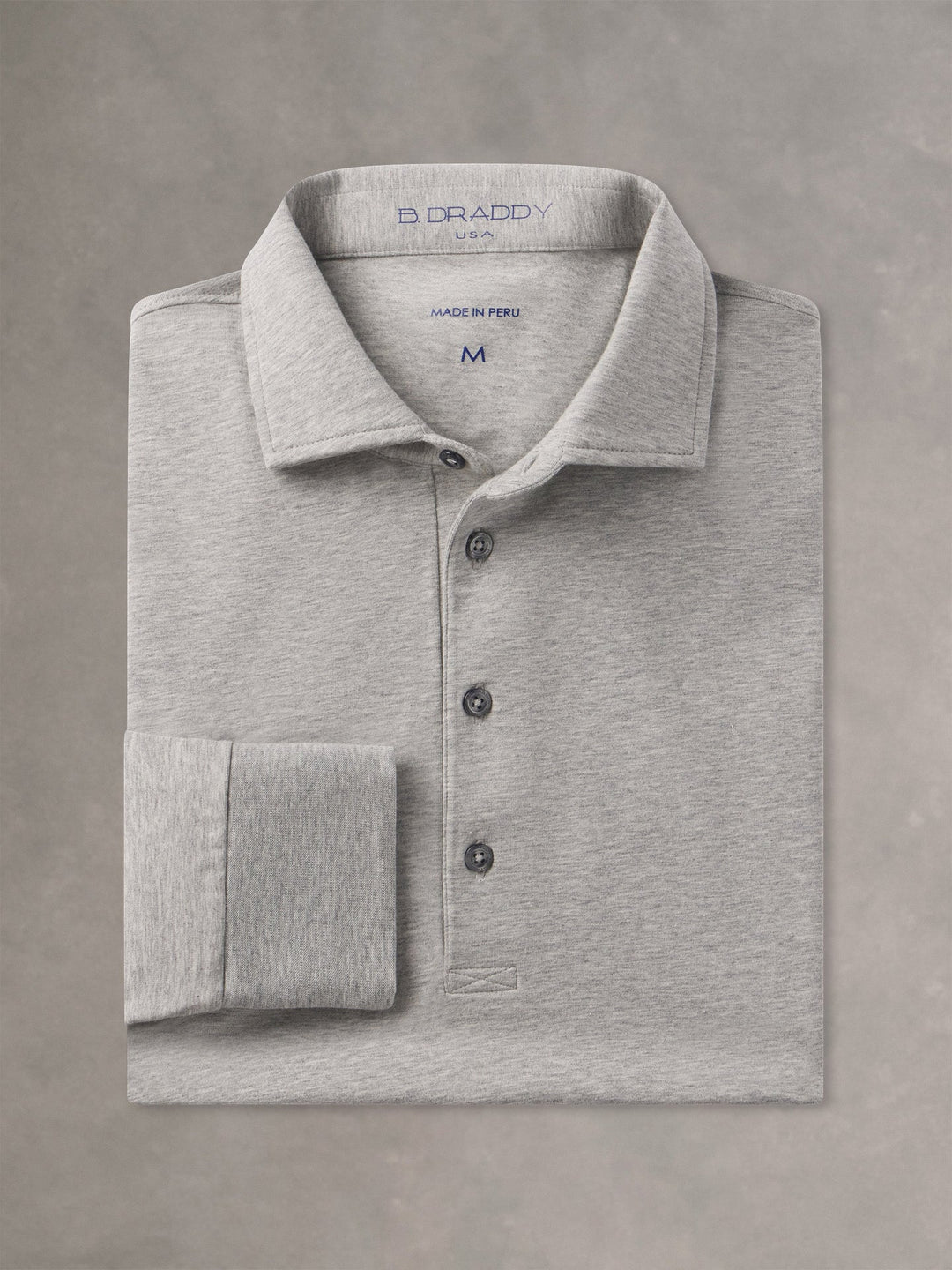 B. Draddy Quinlivan Cotton Polo